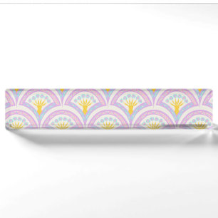 Pastel coloured shell pattern nameplate