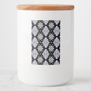 Pastel floral shapes on a black background food label