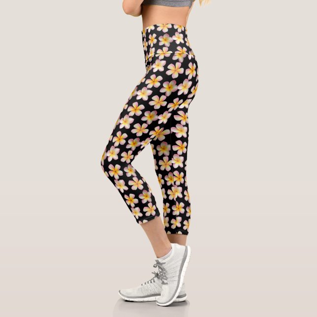 Pastel Frangipani Plumeria Flowers on Black Capri Leggings (Left)