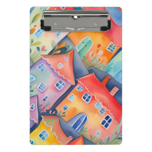 Pastel little houses in soft colour, peaceful colo mini clipboard