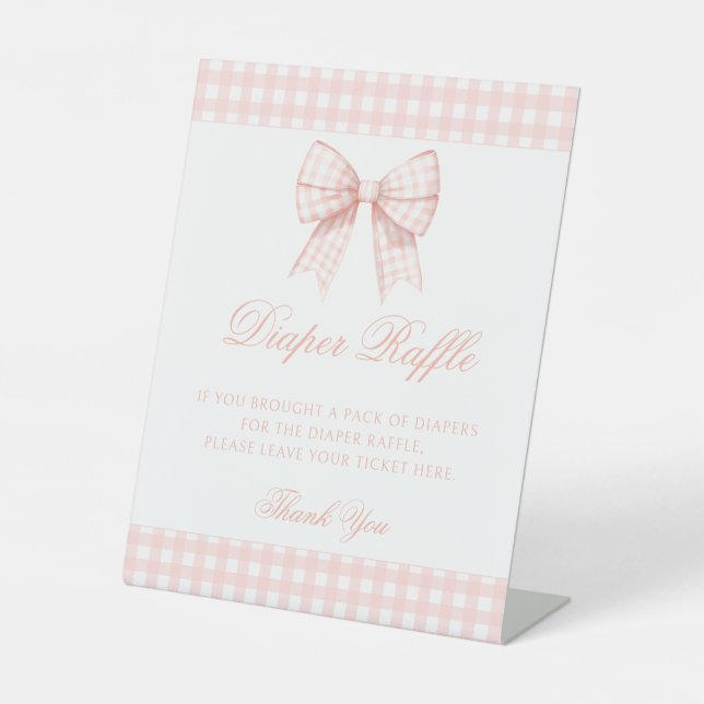 Pastel pink gingham bow baby shower diaper raffle pedestal sign (Front)