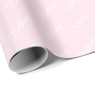 Pastel pink with white text. wrapping paper