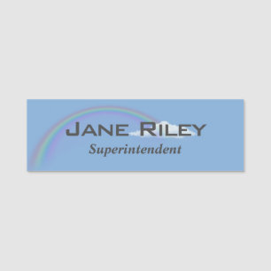 pastel rainbow in cloud on blue name tag