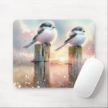Pastel Watercolor Birds Fencepost Sunset Mouse Pad<br><div class="desc">Soft watercolor brushwork captures two fluffy songbirds resting on weathered fence posts as a glowing sunset spreads across a dreamy countryside sky. Gentle washes of peach, blush pink, pale blue, and warm gold blend into a tranquil horizon, creating a calm pastoral atmosphere. The birds appear round and feathery, their delicate...</div>