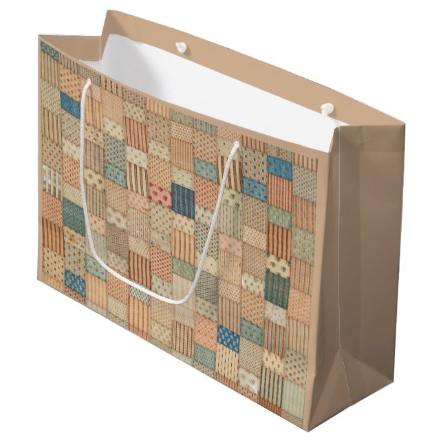 Patchwork quilt in muted colours Gift Bag (Front Angled)