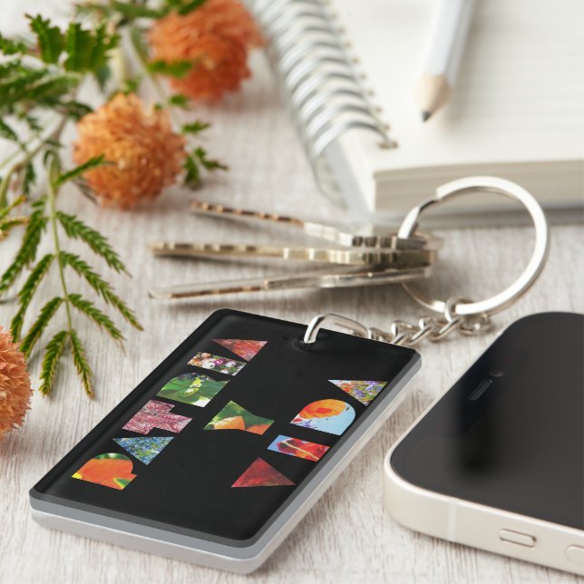 Patria y Vida Black Floral Letters Key Ring (Front Right)