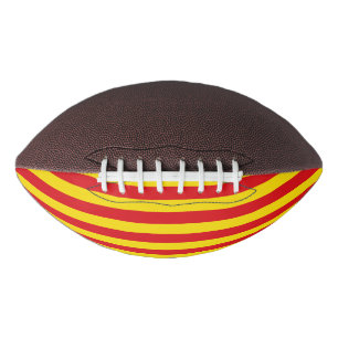 Patriotic american football with flag of Catalonia