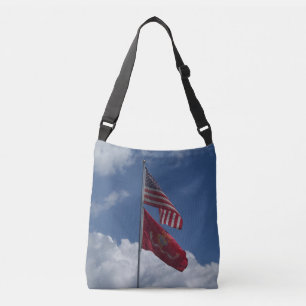 Patriotic flags and a blue sky on a crossbody bag