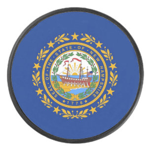 Patriotic hockey puck with flag of New Hampshire