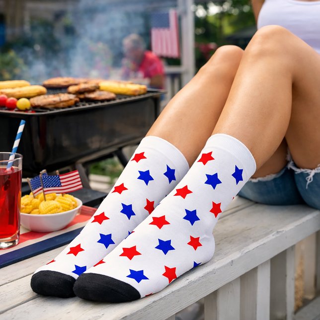Patriotic Red and Blue Star Toss Pattern White  Socks (A pair of socks with a red and blue star pattern on a white background.)