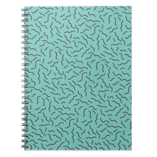 Patterend on green notebook