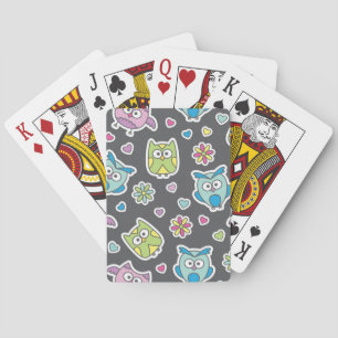pattern of cartoon owls playing cards