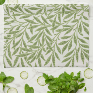 Pattern of green leafy branches tea towel