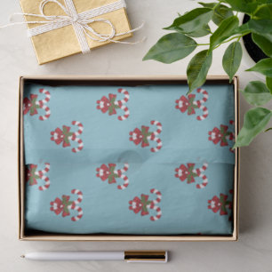 Pattern Of Two Red And White Candy Canes On Blue Tissue Paper