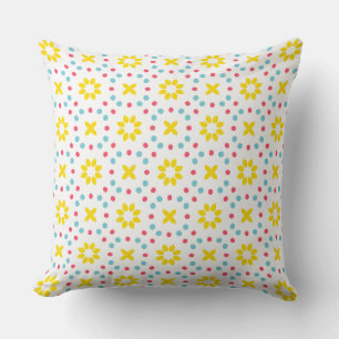 pattern of yellow flowers and red and blue dots cushion