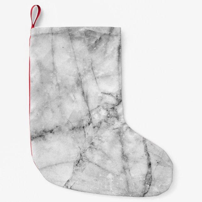 Pattern on the white marble floor texture and back small christmas stocking (Front)