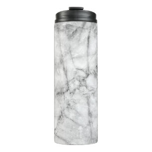 Pattern on the white marble floor texture and back thermal tumbler
