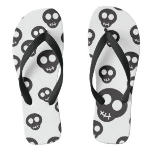 Pattern with black skulls on white thongs