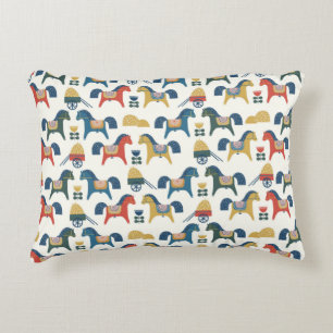 Pattern with horses inspired by scandinavian art. decorative cushion