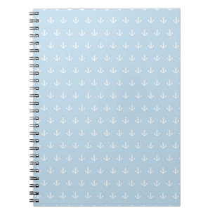 Pattern with white anchors on blue notebook