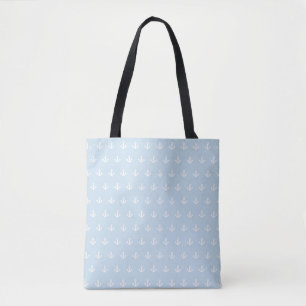 Pattern with white anchors on blue tote bag