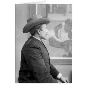 Paul Gauguin in front of his canvases