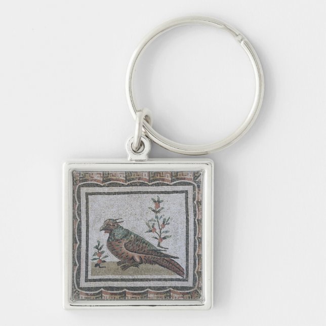 Pavement depicting a pheasant key ring (Front)