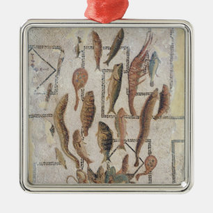 Pavement depicting fish escaping from a basket metal ornament