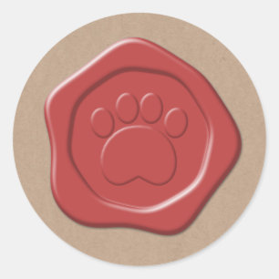 paw print red wax seal on brown paper