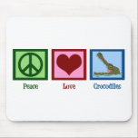 Peace Love Crocodiles Mouse Pad<br><div class="desc">A peace sign,  heart,  and a cute croc rising out of the lake with big teeth!</div>
