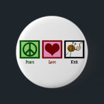 Peace Love & Knitting 6 Cm Round Badge<br><div class="desc">I don't go anywhere without my needles and yarn for knitting. A cute knitter gift that reads Peace Love Knit under a pretty design.</div>
