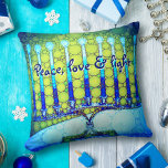 Peace Love Light Bold Blue Green Hanukkah Menorah Cushion<br><div class="desc">“Peace, love & light.” A close-up photo of a bright, colourful, blue and green artsy menorah helps you usher in the holiday of Hanukkah in style. Feel the warmth and joy of the holiday season whenever you relax on this stunning, colourful Hanukkah throw pillow. Makes a striking set of four...</div>