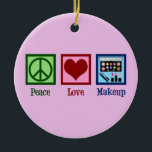 Peace Love Makeup Artist Ceramic Ornament<br><div class="desc">Peace Love Makeup Artist. A cute makeup artists gift for a cosmetology student or cosmetologist who works with applying make-up or cosmetics. A peace sign,  heart,  and chic eyeshadow palette and pretty lipstick set design.</div>