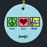 Peace Love Music Custom Christmas Ceramic Ornament<br><div class="desc">Pretty personalised musician Christmas ornament featuring a peace sign,  heart,  and a treble clef and musical staff. Cool custom PEACE LOVE MUSIC gift for a composer,  music teacher,  band director or choir conductor to give to their music students.</div>