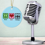 Peace Love Podcasts Ceramic Ornament<br><div class="desc">Peace Love Podcasts. A cute podcast lover gift for a podcaster who makes radio shows. It features a peace sign,  heart,  and pair of headphones with a microphone.</div>