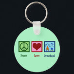 Peace Love Preschool Teacher Key Ring<br><div class="desc">Peace Love Preschool Christmas gift for a Pre K teacher who loves teaching little kids and toddlers. A cute peace sign, heart, and children holding hands. A nice present to show your appreciation for the holidays or Teacher Appreciation Week at the end of the year. A cute Mother's Day Out...</div>