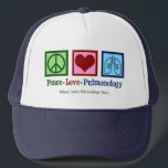 Peace Love Pulmonology Customisable Pulmonologist Trucker Hat<br><div class="desc">Peace Love Pulmonology hat. A cool pulmonologistgift for a pulmonology doctor or nurse with a peace sign,  heart,  and lungs. A great design for a pulmonary specialist who treats asthma and other respiratory issues.</div>