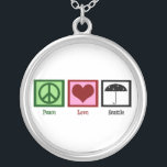 Peace Love Seattle Silver Plated Necklace<br><div class="desc">A peace sign,  heart,  and an umbrella under the rain to symbolise Seattle.</div>