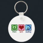 Peace Love Surfing Key Ring<br><div class="desc">Peace Love Surfing Gift. An awesome surfing design with a peace sign, heart, and a cool surfer on a surfboard riding blue waves. I love going to the ocean when the surf is wild.</div>