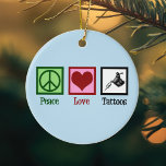 Peace Love Tattoos Ceramic Ornament<br><div class="desc">Peace Love Tattoos. A cool tattoo artist gift with a peace sign,  heart,  and tattoo gun for a tattooist. Cute tattooer present.</div>