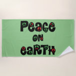 Peace On Earth Christmas Beach Towel<br><div class="desc">Cute and meaningful Christmas themed graphic with red and green accented peace signs in each letter. Wishing Peace on Earth...  on Christmas and everyday.</div>