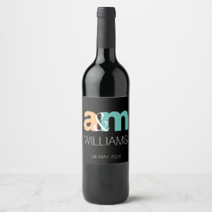 Peach and turquoise elegant monogram design wine label