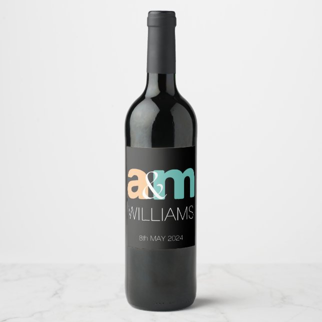 Peach and turquoise elegant monogram design wine label (Front)