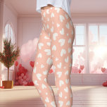 Peach and White Heart Pattern Valentine's Day Leggings<br><div class="desc">Celebrate love in comfort and style with these Peach and White Heart Pattern Valentine's Day Leggings. Featuring soft peach tones and white heart prints, these leggings are a cute and subtle way to express your romantic side. Perfect for Valentine's Day events or adding a lovely touch to your casual outfits,...</div>