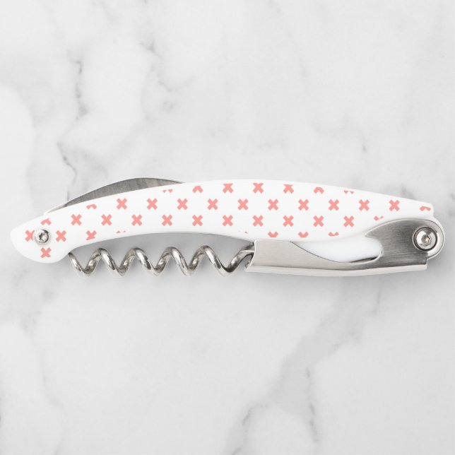 Peach cross stitches on white corkscrew (Back)