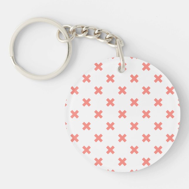 Peach cross stitches on white key ring (Front)