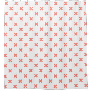 Peach cross stitches on white shower curtain