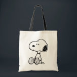 PEANUTS | Snoopy on Black White Comics Tote Bag<br><div class="desc">This Peanuts artwork features Snoopy sitting on background of black and white Charles M. Schulz comic strips.</div>