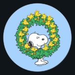 Peanuts | Snoopy & Woodstock Christmas Wreath Classic Round Sticker<br><div class="desc">Celebrate the holidays and your love of Peanuts with this cute design featuring Snoopy,  Woodstock and friends in a holiday wreath.</div>