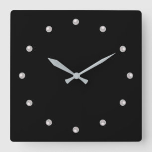 Pearls on black background . square wall clock